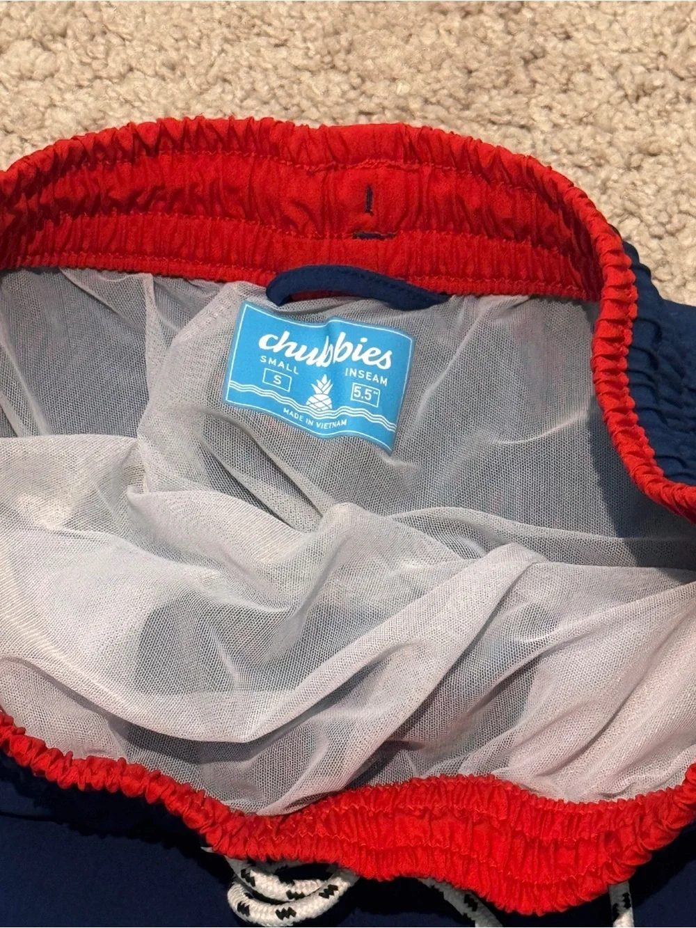 chubbies Navy Swim Trunks with Red Waistband